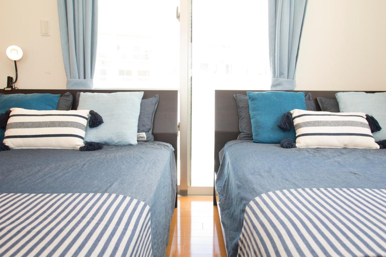 Okinawa Guesthouse Tt Koza מראה חיצוני תמונה
